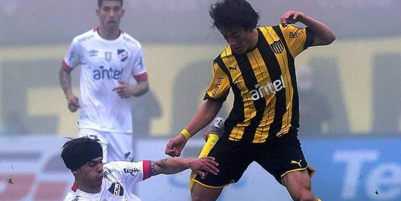 Volvió el fútbol en Uruguay: Nacional y Peñarol igualaron bajo la neblina