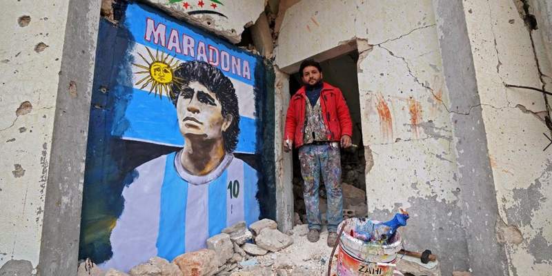 El mural homenaje que pintó un sirio en medio de las ruinas